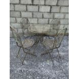 A GARDEN SUITE OF FURNITURE, includes a small circular table with mesh top, and four folding chairs,
