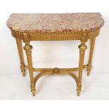 A VERY FINE 19TH CENTURY MARBLE TOP GILT CONSOLE TABLE, with breakfront, the frame decorated with a