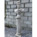 A STONE GARDEN ORNAMENT IN THE FORM OF A BUST OF MARC ANTONY, sitting on a column base, 5ft tall app