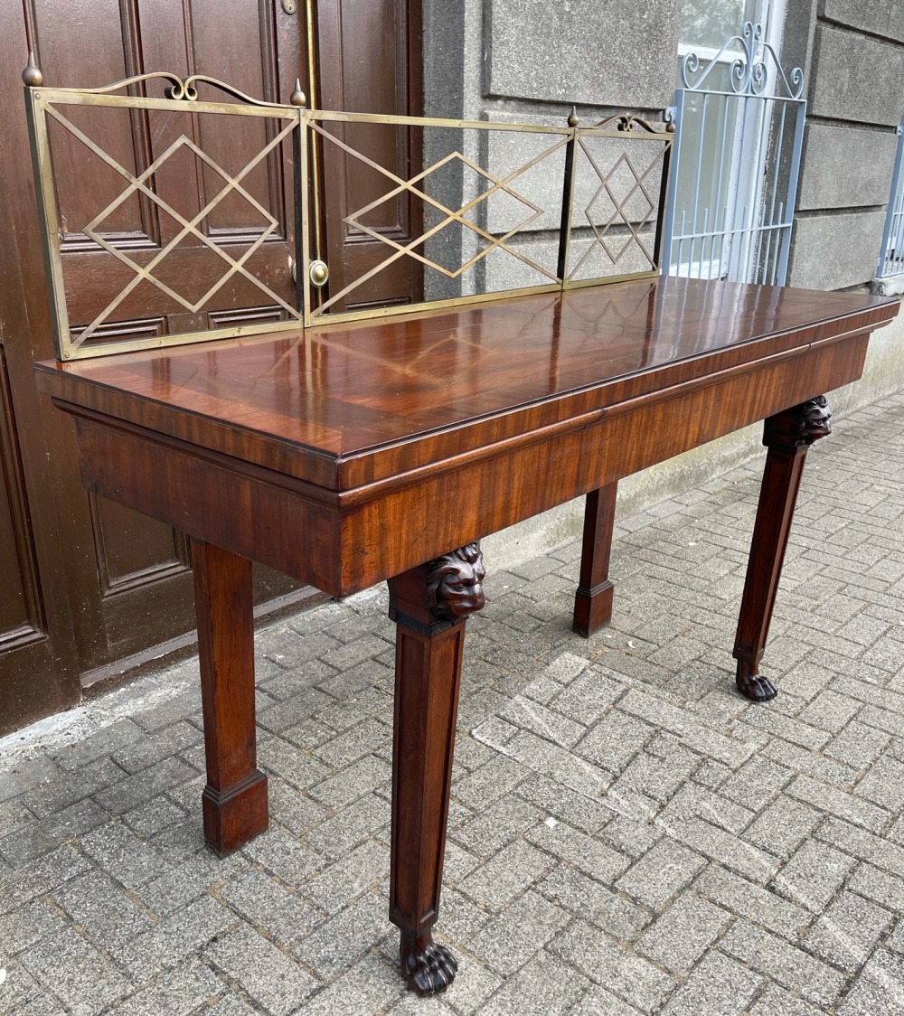 A GOOD QUALITY IRISH MAHOGANY SERVING / SIDE BOARD, with brass gallery rail to the back, with cross- - Image 3 of 7