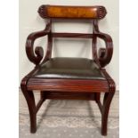 A SUPBERB METAMORPHIC REGENCY STYLE MAHOGANY AND WALNUT LIBRARY STEPS ARMCHAIR, the frame decorated
