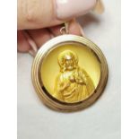 A SOLID 10K GOLD RELIGIOUS PENDANT, double sided 3D pendant, with image of Jesus to one side, and Ma