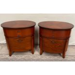 A PAIR OF OVAL SHAPED 2 DRAWER WALNUT LOCKERS / CABINETS, 1960s style, 60cm x 62cm x 45cm approx. (H