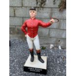 A CAST IRON GARDEN ORNAMENT / HITCHING POST, ‘JAMES BROWN SADDLERY’, size: 29 inches tall approx.