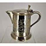 A SILVER PLATED LIDDED JUG, Sheffield