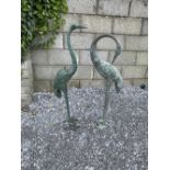 A PAIR OF GARDEN ORNAMENTS in the form of Heron birds, size: 3ft tall approx.