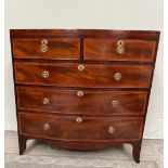 A VERY FINE AND ATTRACTIVE BOW FRONTED REGENCY MAHOGANY CHEST OF DRAWERS, with cross-banded and inla
