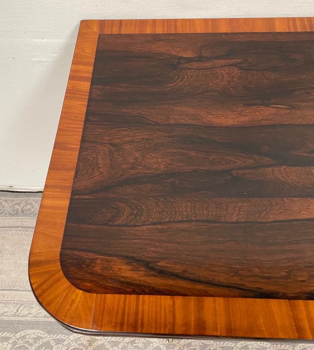 A FINE REGENCY ROSEWOOD FOLD OVER CARD TABLE, with cross-banded top having rounded corners, over a d - Image 5 of 7