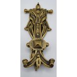 A 19TH CENTURY BRASS DOOR KNOCKER, with scrolling design, 19cm (H) x 8.3cm (W) x 2.5cm (D) approx.