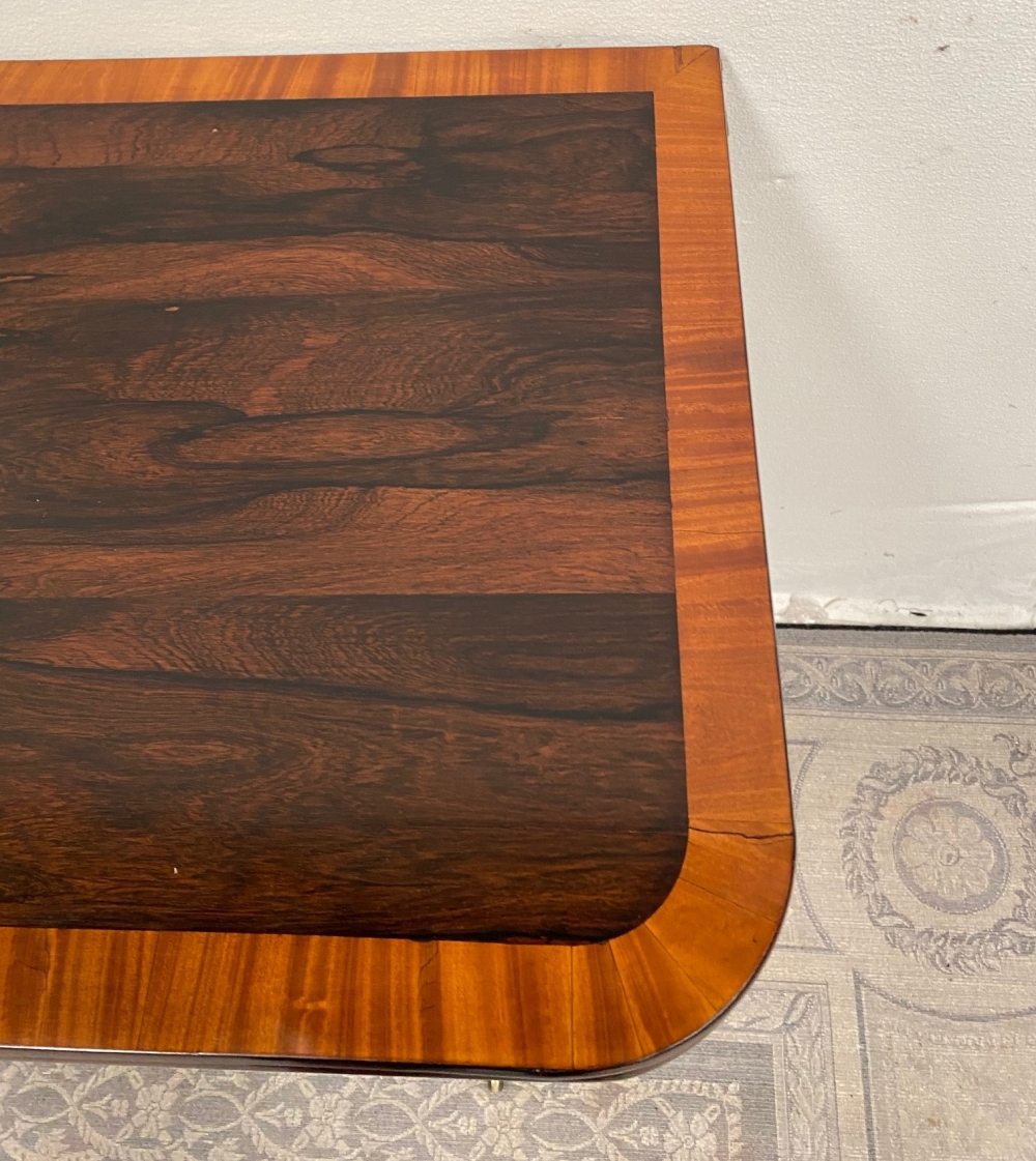 A FINE REGENCY ROSEWOOD FOLD OVER CARD TABLE, with cross-banded top having rounded corners, over a d - Image 6 of 7