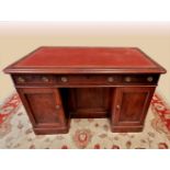 A GOOD QUALITY 19TH CENTURY PARTNERS DESK, with tooled leather top, having 3 frieze drawers to the f
