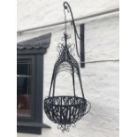 A PAIR OF BLACK METAL HANGING BASKETS, 115cm x 48cm approx.