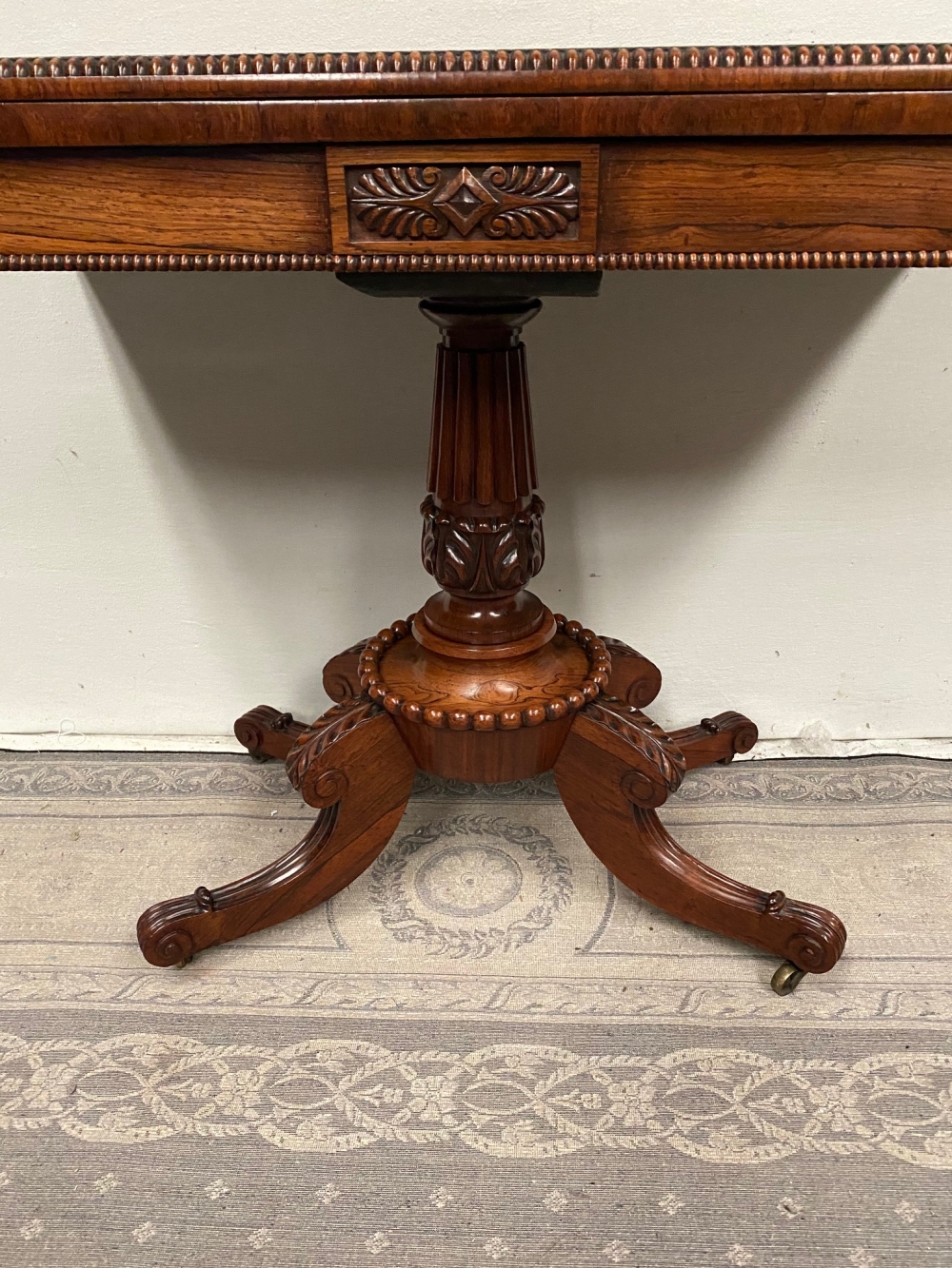 A VERY FINE REGENCY ROSEWOOD FOLD OVER CARD TABLE, with gadrooned rim to the curved fold over top, a - Image 2 of 6