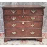 AN 18TH CENTURY WALNUT CHEST OF DRAWERS, 2 over 3, with herringbone cross-banded detail to the top,