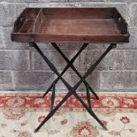 AN 18TH CENTURY BUTLERS TRAY AND STAND, folding simulated bamboo stand ebonised with canvas stretche