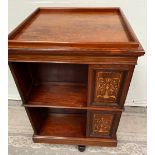 A VERY FINE ROSEWOOD REVOLVING BOOKCASE, with raised edge to the top, and decorated marquetry inlaid