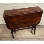 A GOOD ROSEWOOD DROP LEAF TABLE, with inlaid decoration, canted sides to the drop leaves, raised on