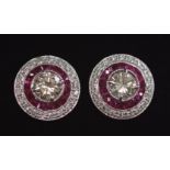 A PAIR OF 18CT WHITE GOLD TARGET STYLE RUBY & DIAMOND EARRINGS, with 2.40cts approx.