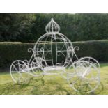 A GARDEN ORNAMENT IN THE FORM OF A METAL CINDERELLA CARRIAGE, white colour, 5ft h x 6ft l approx.