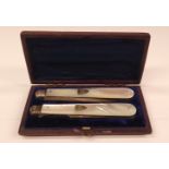 A CASED MOTHER OF PEARL FOLDING KNIFE AND FORK SET, Sheffield, Date letters for 1875 and 1877, maker