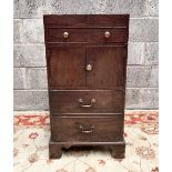 A 19TH CENTURY MAHOGANY CABINET OR GENTLEMANS WASH CABINET, the top opens out, with a faux drawer be