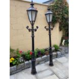 A PAIR OF CAST IRON GARDEN / DRIVE WAY LIGHTS