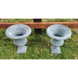 A GOOD QUALITY PAIR OF HEAVY REGENCY STYLE FLUTED GARDEN URNS, 47cm (H) x 38.1cm (W) approx.