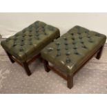 A PAIR OF CHESTERFIELD STYLE BUTTON TOPPED GREEN LEATHER FOOT STOOLS, with beaded detail, raised on