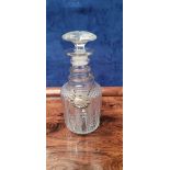 A GOOD QUALITY IRISH CUT GLASS DECANTER, with three ring neck, followed by step cut and a shoulder o