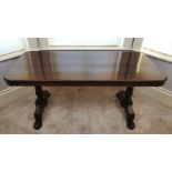 A VERY FINE REGENCY ROSEWOOD LIBRARY TABLE, with gadrooned edging to the top and base, raised on car