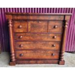 A LARGE CHEST OF DRAWERS, with flame mahogany veneers, cross-banding to the three deep drawers, 1 ov