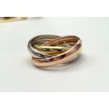 A 9CT GOLD RUSSIAN WEDDING BAND, a traditional 9ct Russian gold wedding ring, with classic Rose, Whi