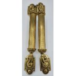 A FINE PAIR OF POLISHED BRASS 19TH CENTURY DOOR PULL HANDLES, in excellent condition, 39.4cm x 6.3cm