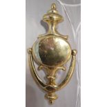 A 19TH CENTURY BRASS DOOR KNOCKER, in excellent condition, 24.1cm x 11.4cm x 2.5cm approx.