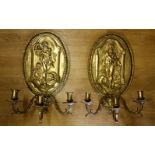 A LARGE PAIR OF 19TH CENTURY CAST BRASS WALL SCONCES, each with 3 candle holders, extended on scroll