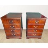 A PAIR OF CONTEMPORARY TWO DRAWER CHESTS, each with deep drawers, the fronts with a faux drawer on e