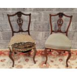 A PAIR OF CHAIRS, with carved back rest, stuffed over seats, raised on cabriole shaped legs, 92 x 48