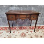 A GOOD 19TH CENTURY IRISH MAHOGANY DESK / DRESSING TABLE, with three frieze drawers, each with cock-