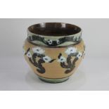 A Doulton Lambeth stoneware jardiniere possibly by Joan Honey, decorated with white petalled flowers