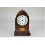 An Edwardian mahogany lancet shaped mantle clock by Kendal & Dent Cheapside, the circular white dial
