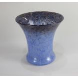 A large Monart blue glass vase flared form with blue mottling and gold flecks to rim, paper label to