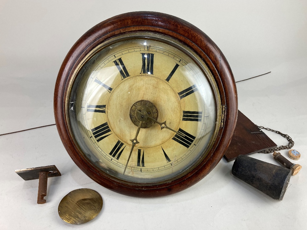 A late 19th century Black Forest circular wall clock with 22cm circular dial, movement striking on a