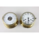 A German brass cased bulkhead style clock and aneroid barometer by Schatz, each with 5 inch dial