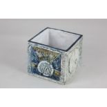 A Troika square pottery vase, with textured abstract decoration in tonal shades of blue and brown,