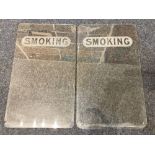 A pair of railway carriage window panes, each engraved "Smoking", 71cm by 42cm, unframed