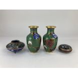 A pair of Cloisonné baluster vases, decorated with floral design on green ground, a Cloisonné