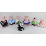 A set of six Wade Nat West pig money boxes including Cousin Wesley and another for the World