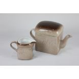 A Carlton Ware novelty Hovis loaf tea pot and matching milk jug, 25cm