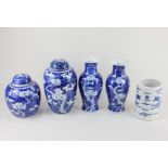 A pair of Chinese porcelain blue and white prunus pattern vases, 20cm high, and two Chinese prunus