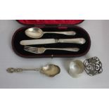 A cased George V silver christening set of spoon, knife (a/f) and fork, engraved with the Royal